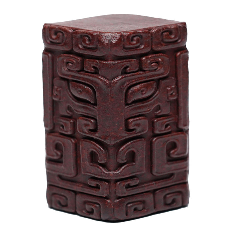 Handmade Yixing purple sand tea pet with embossed totem pattern, perfect for tea set accessories and decorations.