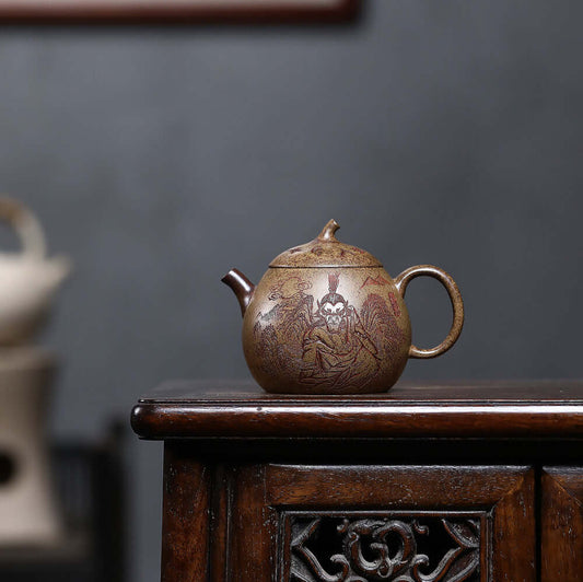 Handmade Yixing purple sand teapot featuring intricate designs, ideal for tea brewing and Kung Fu tea ceremonies.