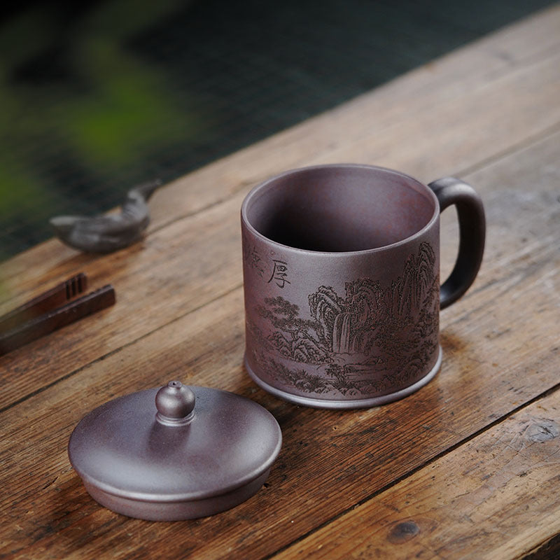 Handmade Yixing purple sand cup with landscape design, large capacity 500ml, perfect for office tea. Original craftsmanship.