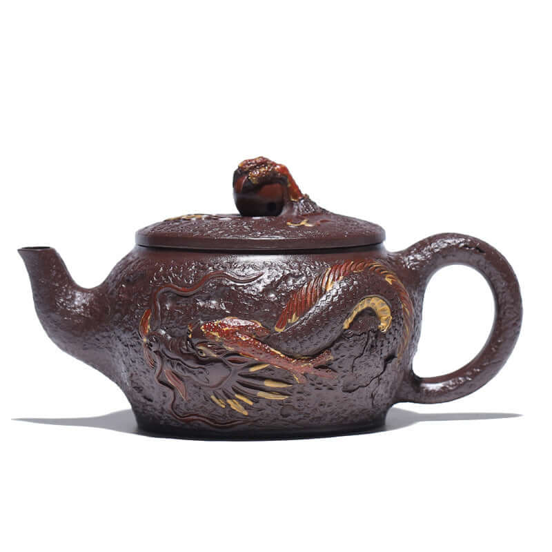 Handmade Yixing purple sand teapot featuring a dragon design, showcasing intricate craftsmanship and artistic detail.
