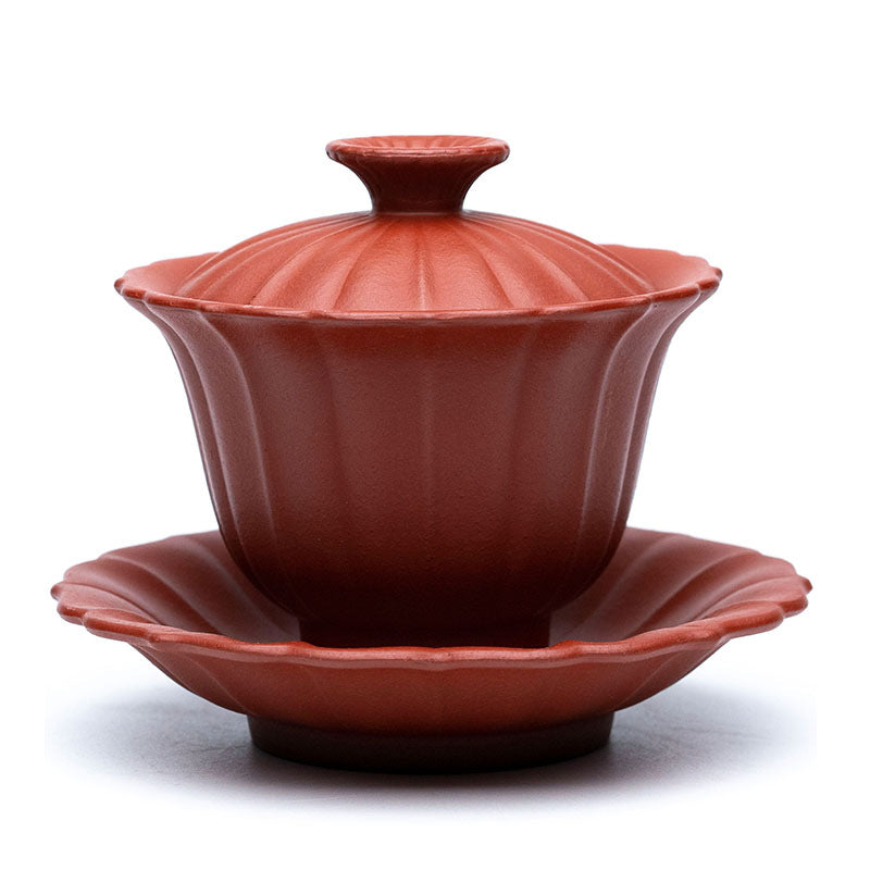 Handmade Yixing purple sand chrysanthemum tea cup and saucer, original artisan craftsmanship, perfect for tea lovers.