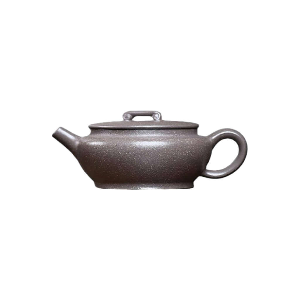 Handmade Yixing purple sand teapot, crafted from raw ore with ruyi design, perfect for kung fu tea sets.