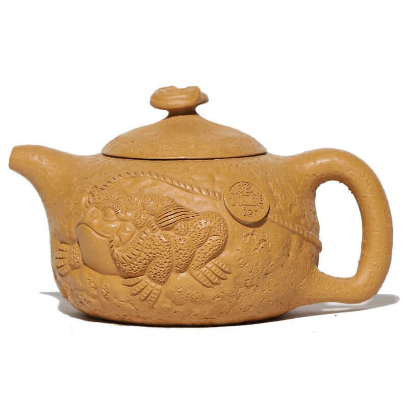 Handmade Yixing purple sand teapot featuring a detailed frog design, showcasing craftsmanship and original raw ore material.