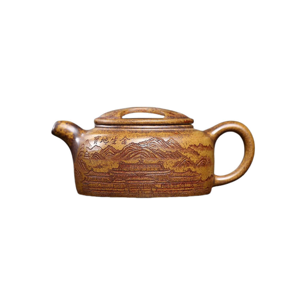 Handmade Yixing purple sand teapot with intricate landscape design, perfect for tea enthusiasts and collectors.