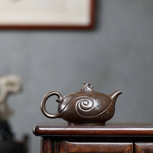 Handmade Yixing purple sand teapot crafted from ancient copper mud, perfect for home kung fu tea sets.