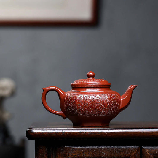 Handmade Yixing purple sand teapot in red slope mud, featuring intricate cipher design, perfect for kung fu tea sets.