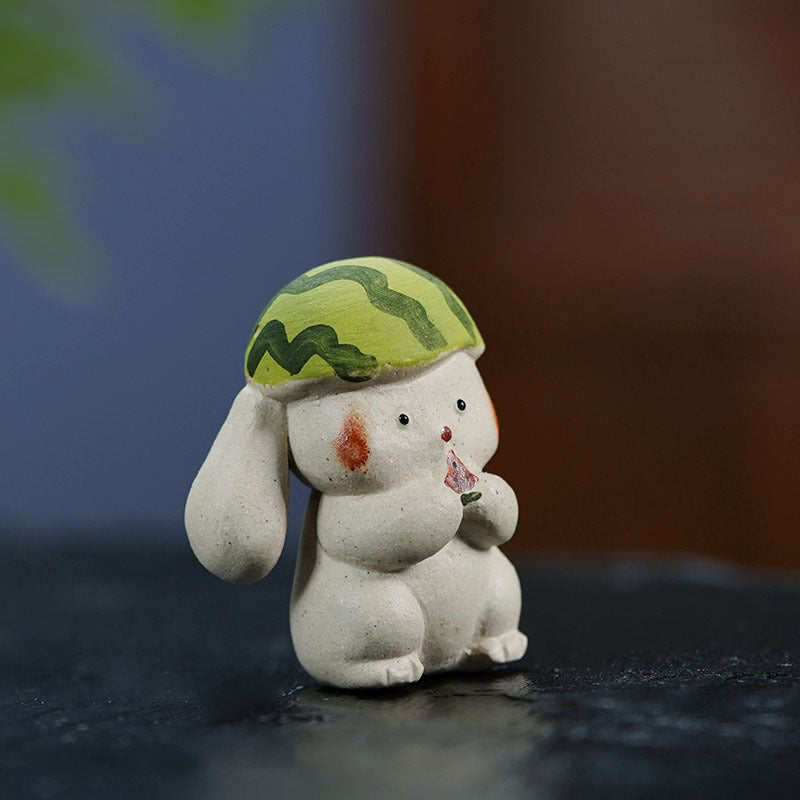 Handmade Yixing purple sand cute little rabbit figure with green hat, a trendy desktop ornament and garden series tea pet.