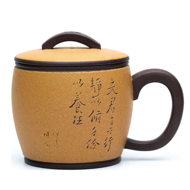 Handmade Yixing purple sand cup with lid, showcasing intricate inscriptions; perfect for tea lovers.