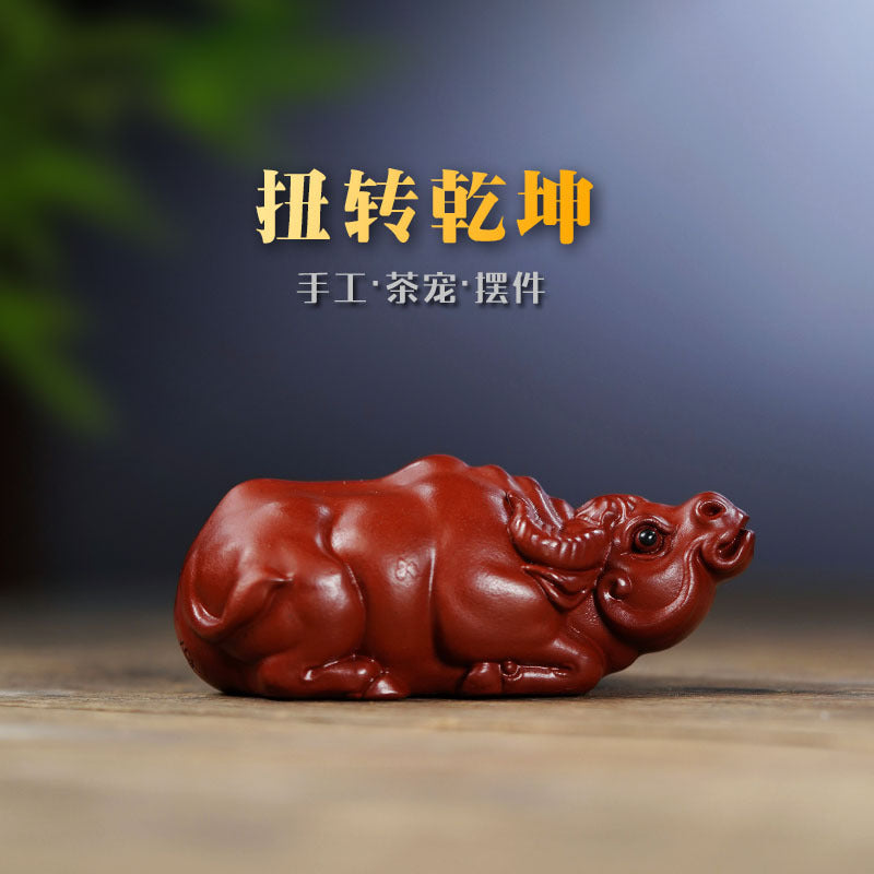 Handmade Yixing purple sand zodiac cattle ornament for tea play, crafted from original zisha materials.