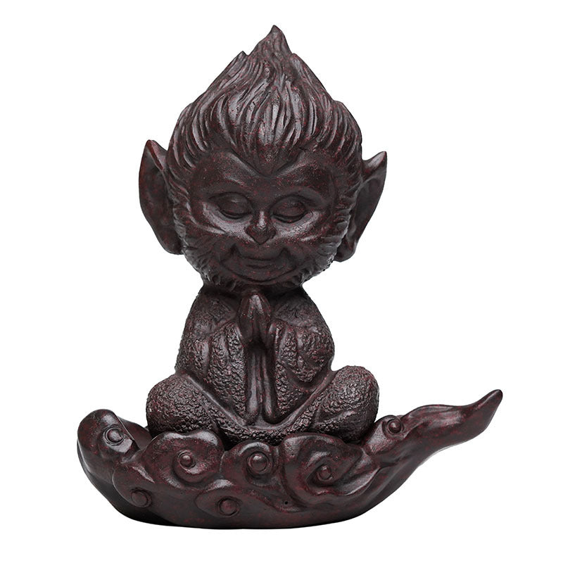 Handmade Chinese-style Sun Wukong ornament in Yixing purple sand, perfect for tea enthusiasts and home decor.