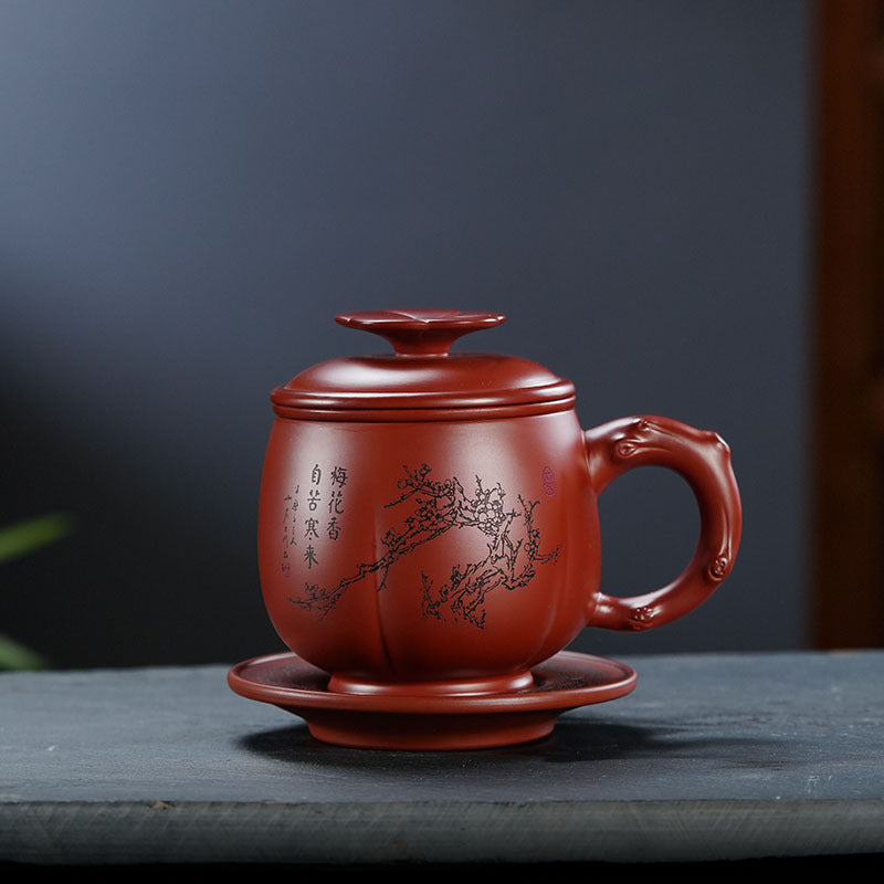 Handmade Yixing purple sand tea cup with plum blossom lid, perfect for enjoying Dahongpao tea. Large-capacity design.