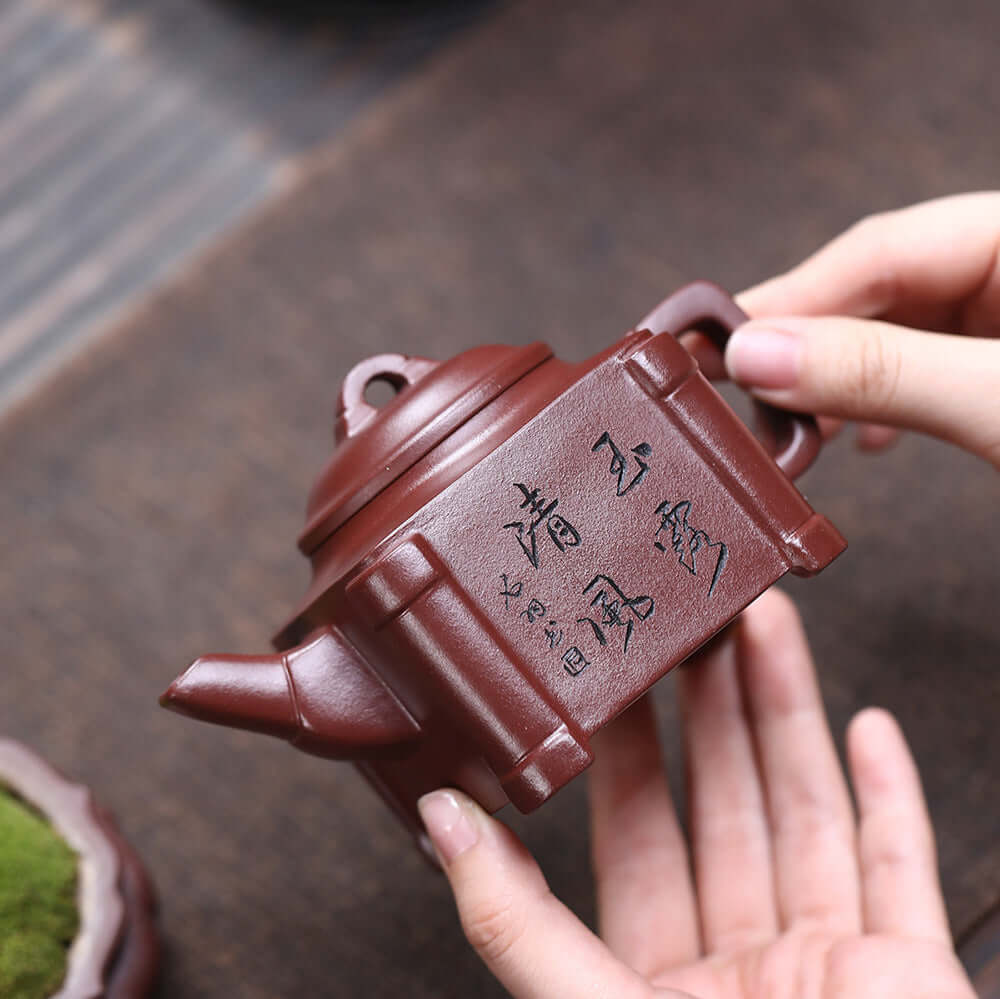 Handmade Yixing purple sand teapot with original mineral design and inscriptions, perfect for Kung Fu tea sets.