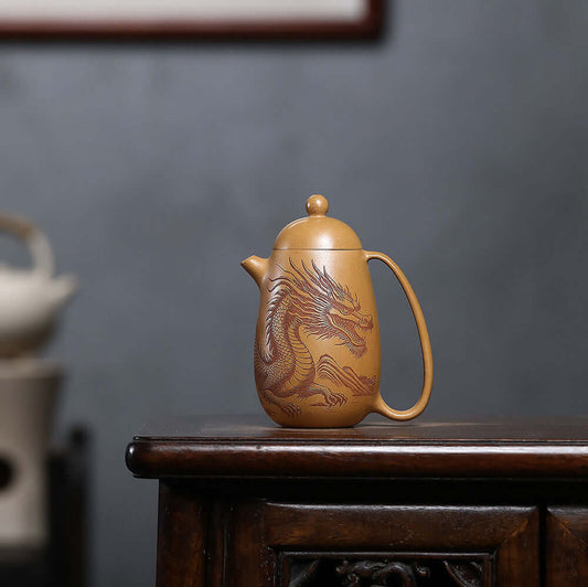 Handmade Yixing purple sand teapot featuring dragon design, perfect for home kung fu tea set.