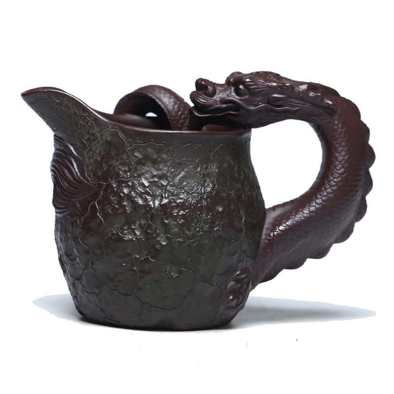 Handmade Yixing high-grade purple sand fair cup with dragon handle, crafted from original purple sand.