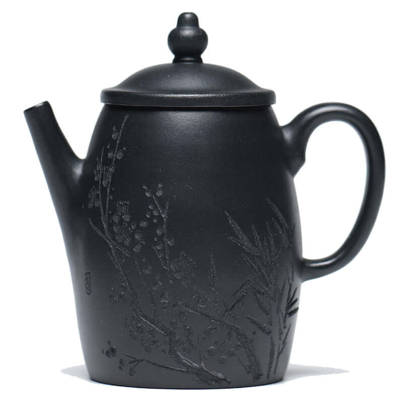 Handmade Yixing purple sand teapot, elegant design with floral engravings, perfect for kung fu tea ceremonies.