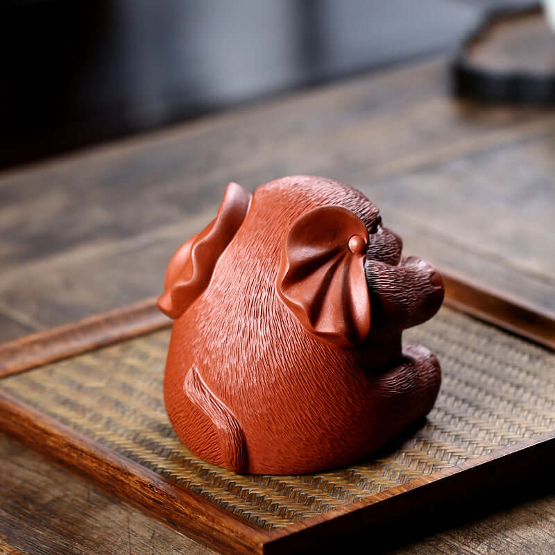 Handmade Yixing purple sand tea pet sculpture of a lucky elephant, showcasing fine detail and traditional design.