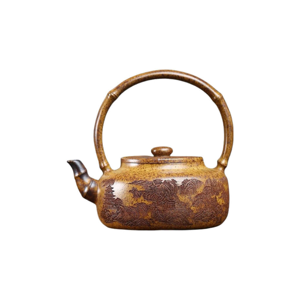 Handmade Yixing purple sand teapot with bamboo handle, featuring intricate mountain scenery design, perfect for Kung Fu tea.