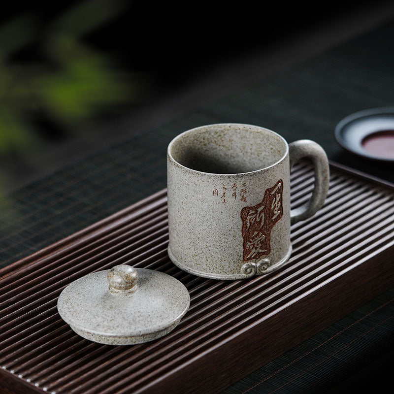 Handmade Yixing purple sand teapot with lid, original craftsmanship, perfect for enjoying tea with style.