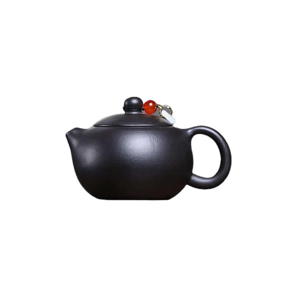 Handmade Yixing purple sand teapot with unique design, perfect for home Kung Fu tea set. Original mineral Da Hong Pao craftsmanship.
