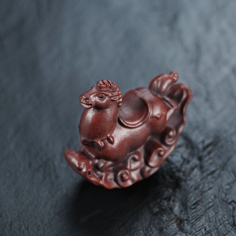 Handmade Yixing purple sand tea pet ornament, creative Trojan horse design for home tea decor and fish tank landscapes.