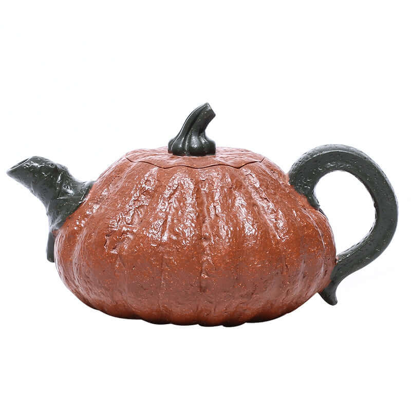 Handmade Yixing purple sand teapot designed as a pumpkin with two-tone clay, showcasing fine craftsmanship.