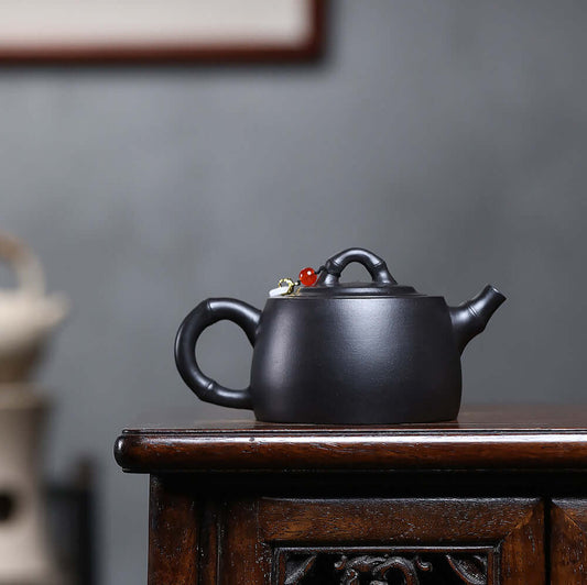 Handmade Yixing purple sand teapot with unique design, perfect for home Kung Fu tea set and stylish decoration.