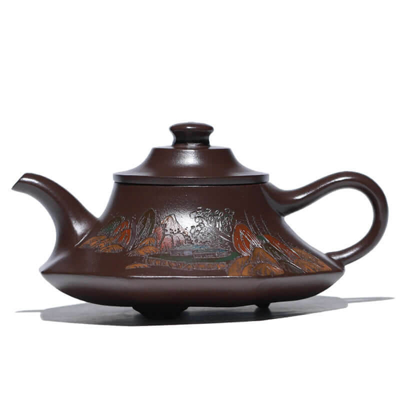 Handmade Yixing purple sand teapot featuring intricate floral designs and elegant curves, perfect for tea enthusiasts.