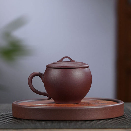 Handmade Yixing purple sand teapot featuring original purple clay, perfect for Kung Fu tea ceremonies, 150cc capacity.
