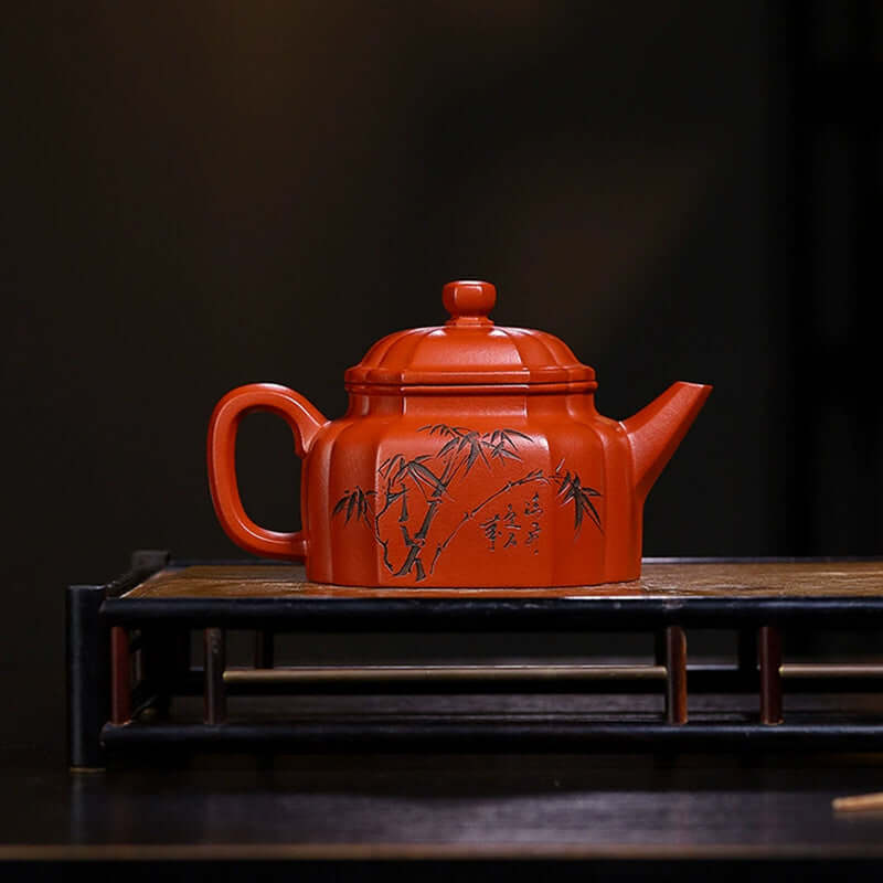 Handmade Yixing purple sand tea pot with bamboo design, showcasing traditional craftsmanship and original materials.