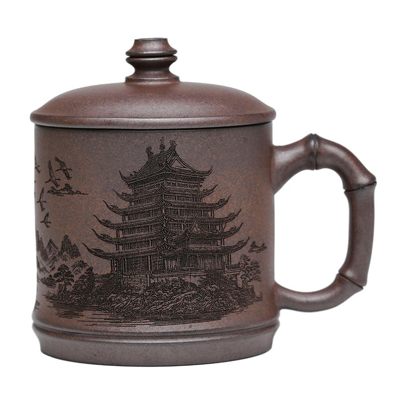 Handmade Yixing purple sand teacup with a detailed pagoda design, perfect for tea lovers and collectors.