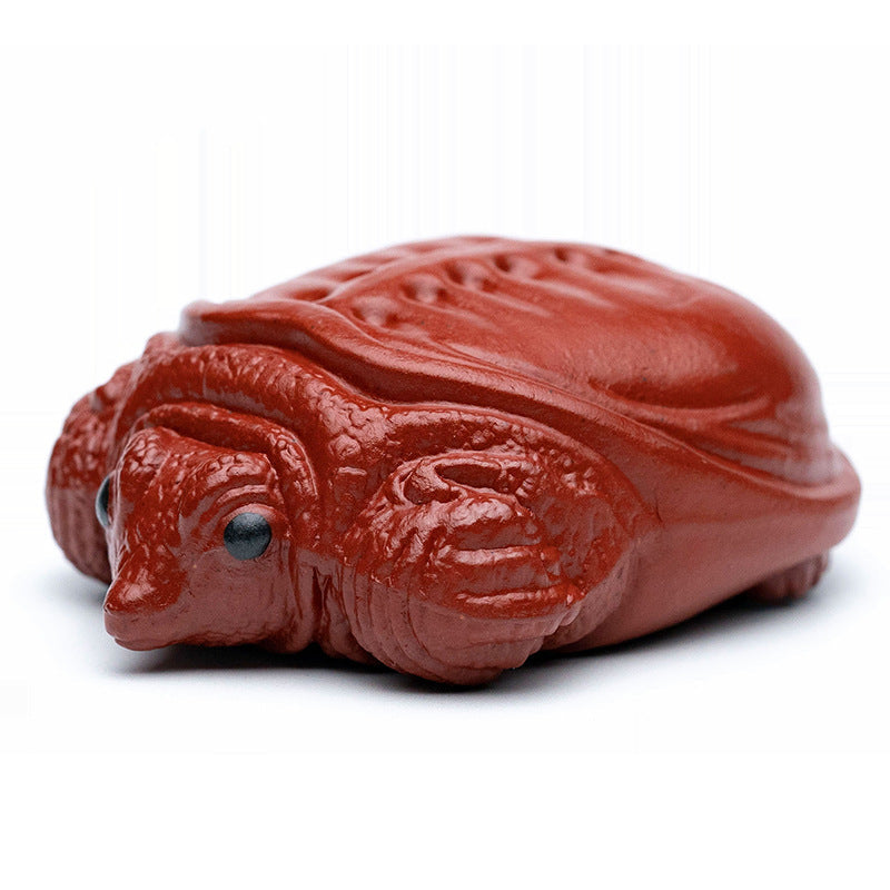 Handmade Yixing purple sand tea pet ornament, turtle design, rich armor world, perfect for tea lovers and collectors.