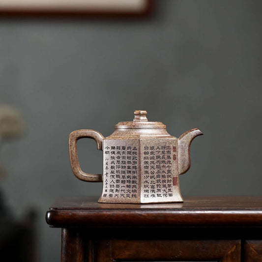 Handmade Yixing purple sand teapot with intricate designs, perfect for home Kung Fu tea set, showcasing original craftsman artistry.