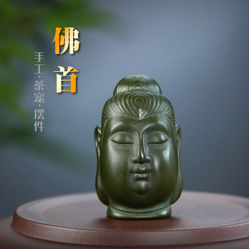 Handmade Yixing purple sand Buddha head ornament for home decor, showcasing original craftsmanship and serenity.