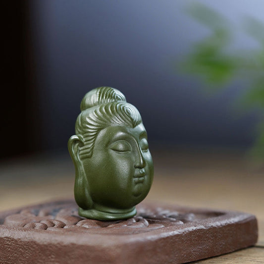 Handmade Yixing purple sand Buddha head ornament for home decor, crafted with original purple sand material.