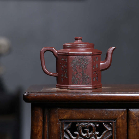 Handmade Yixing purple sand teapot with engravings, showcasing traditional craftsmanship and original purple clay.
