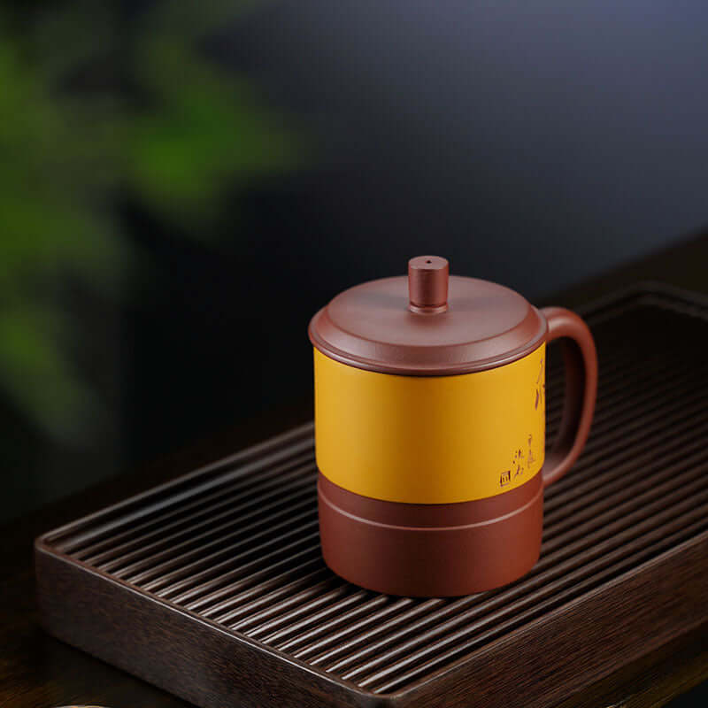 Handmade Yixing purple sand teapot with yellow accent, ideal for soaking tea, large capacity, crafted by Yixing artisans.