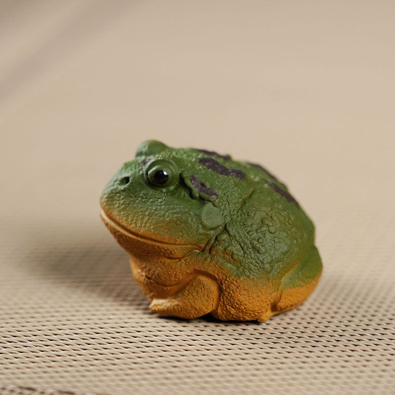Handmade Yixing purple sand tea pet golden toad figurine for wealth attraction, perfect accessory for Kung Fu tea set.