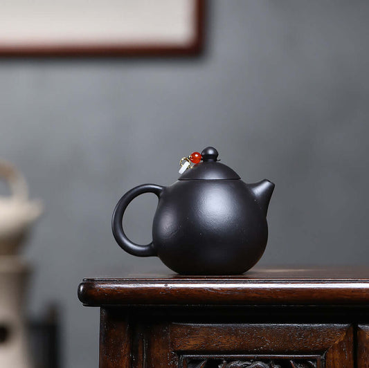 Handmade Yixing purple sand teapot with a sleek design, perfect for a Kung Fu tea set. Original craftsmanship, drop shipping available.