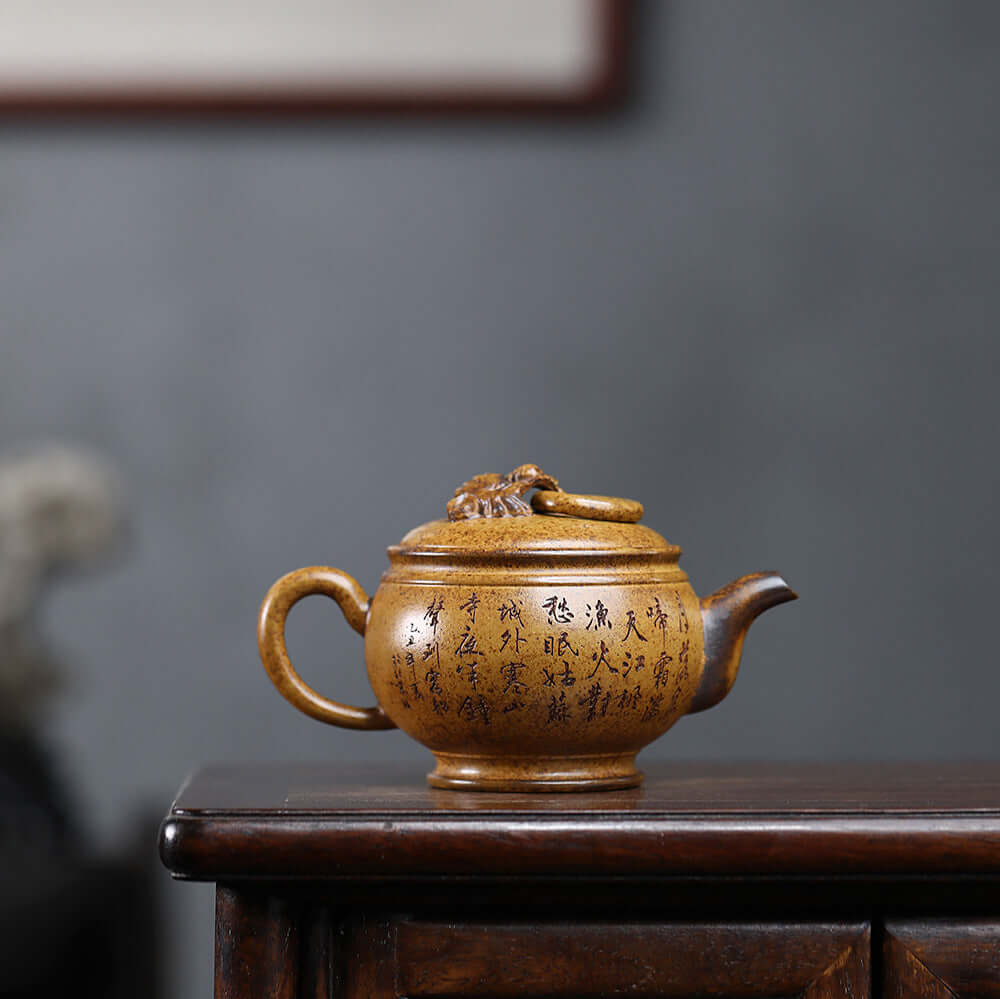 Handmade Yixing purple sand teapot with intricate designs, showcasing unique craftsmanship for authentic kung fu tea sets.