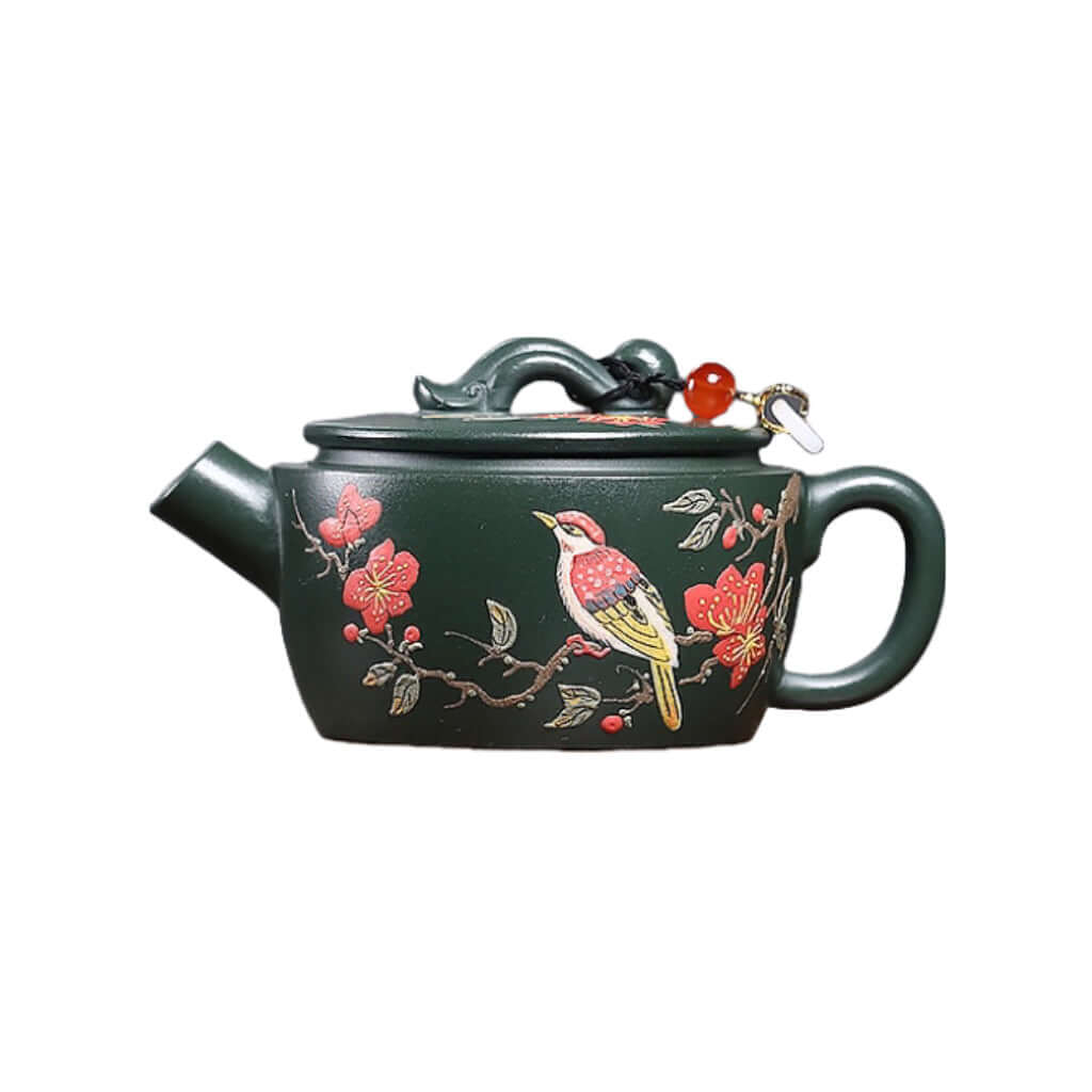 Handmade Yixing purple sand teapot with floral design and bird motif, perfect for kung fu tea set.