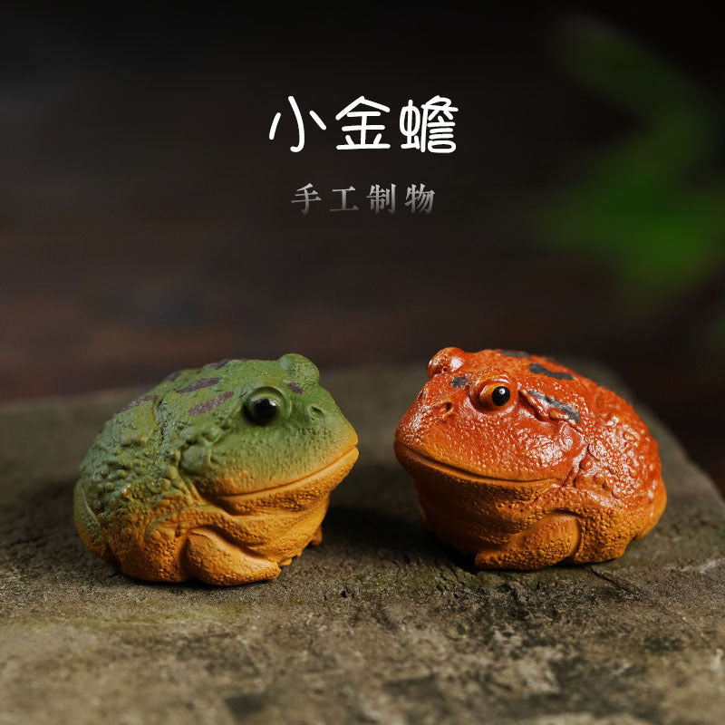 Handmade Yixing purple sand tea pet golden toad ornaments for wealth attraction, perfect for tea sets and decoration.