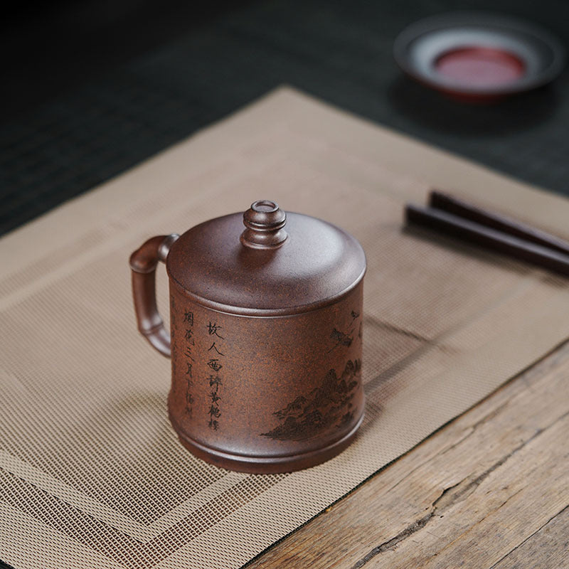 Handmade Yixing purple sand teacup with intricate design, perfect for gifts and tea lovers.