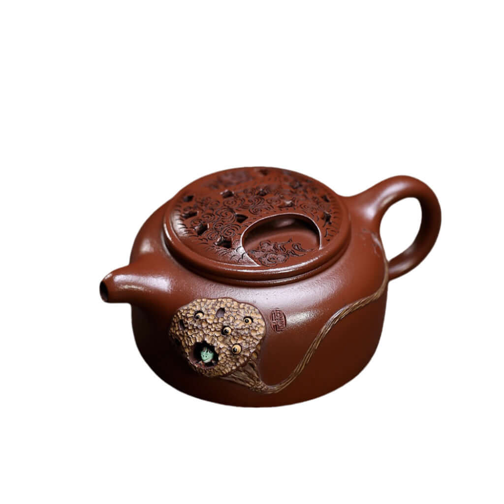 Handmade Yixing purple sand teapot with intricate cow cover and lotus seed design, perfect for kung fu tea sets.