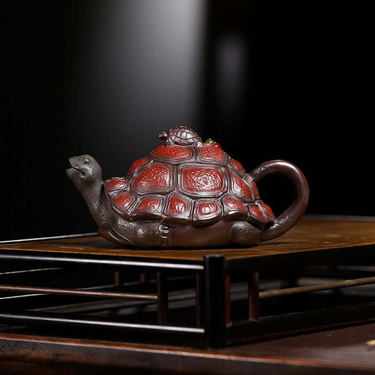 Handmade Yixing purple sand teapot in tortoise shape, featuring original purple sand for a unique tea experience.