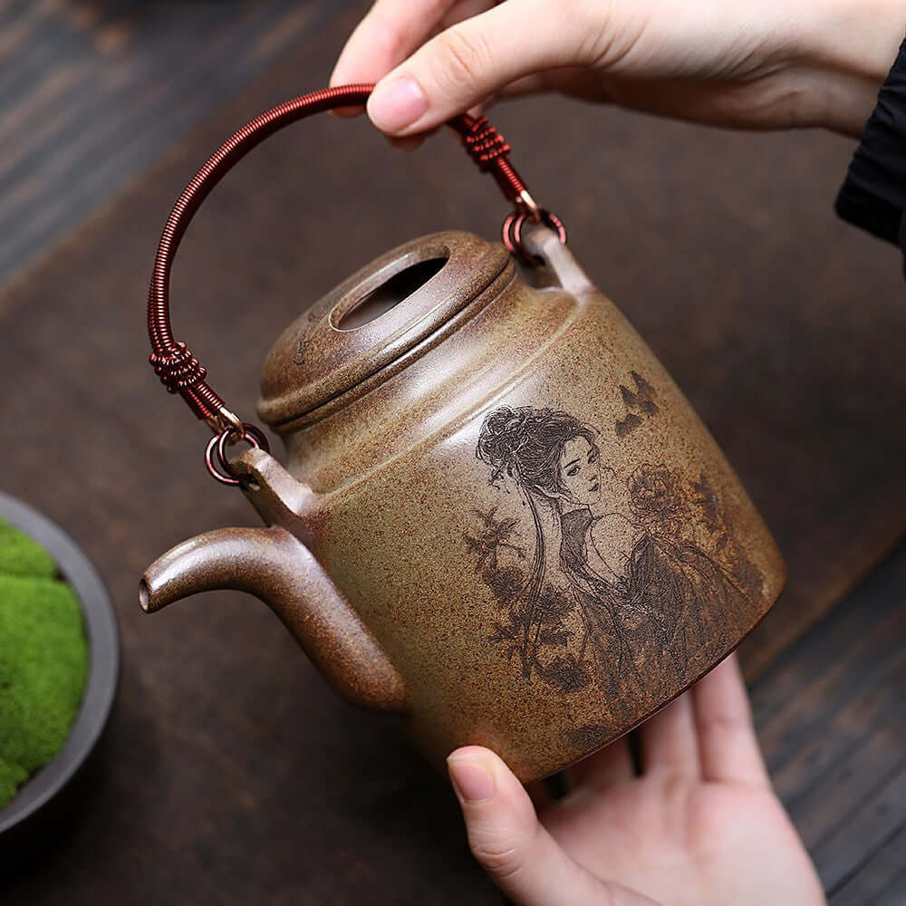 Handmade Yixing purple sand teapot with intricate design, perfect for home kung fu tea set.