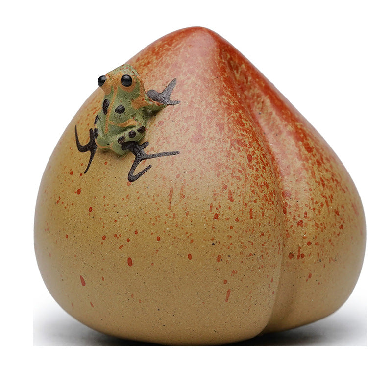 Handmade Yixing purple sand teapot ornament featuring a frog for tea lovers and collectors.
