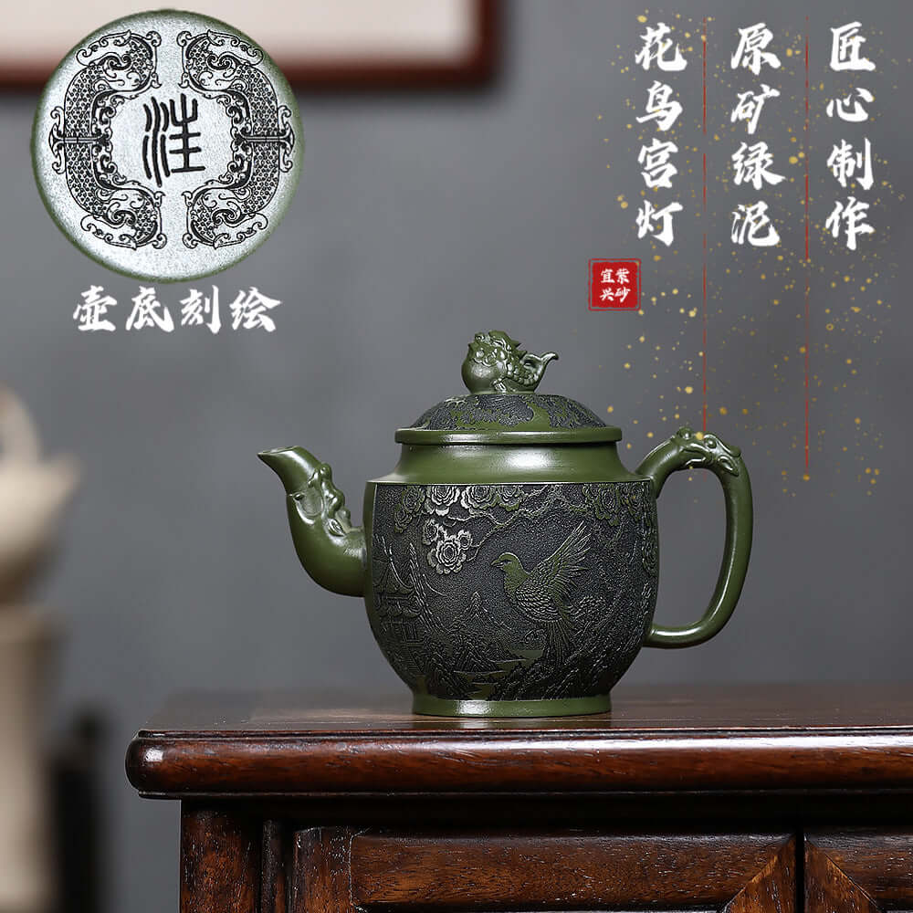 Handmade Yixing purple sand teapot with original green clay carving, featuring flower and bird design.