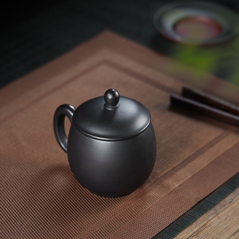 Handmade Yixing purple sand cover cup, dark green enamel, exquisite craftsmanship, perfect for tea enthusiasts.