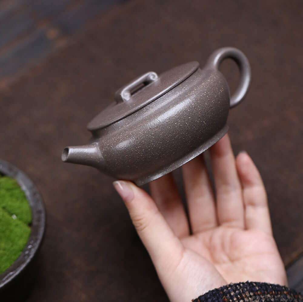 Handmade Yixing purple sand teapot, crafted from raw ore, perfect for home kung fu tea sets.