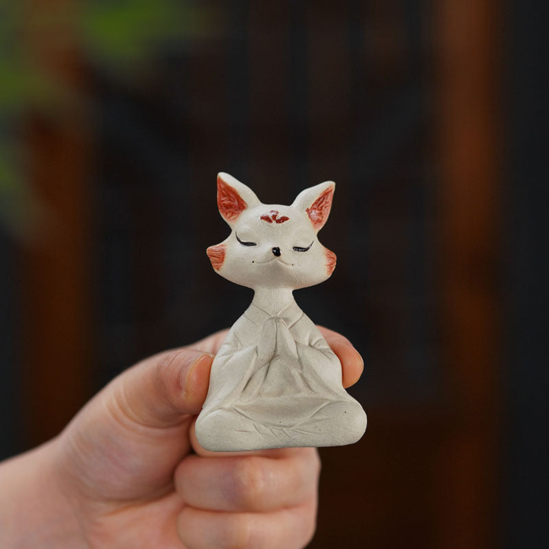 Handmade purple clay tea pet fox sculpture, Yixing craftsman original design, perfect for tea table decor.